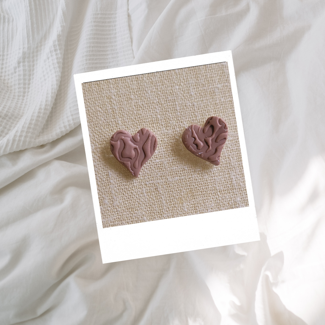 In the nude- heart stud